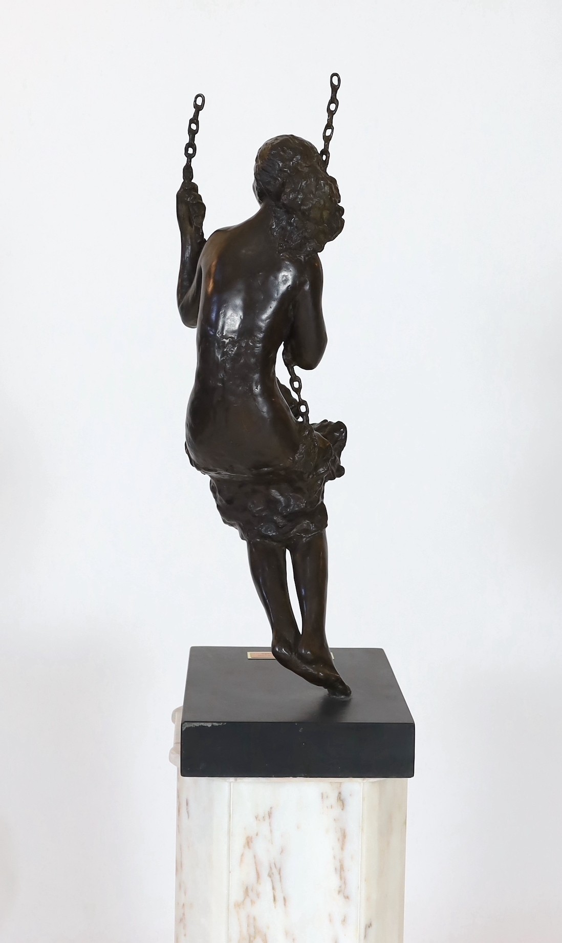 Sydney Harpley R.A. (British, 1927-1992), bronze, 'Girl on a Swing', overall height 85cm excluding white marble pedestal